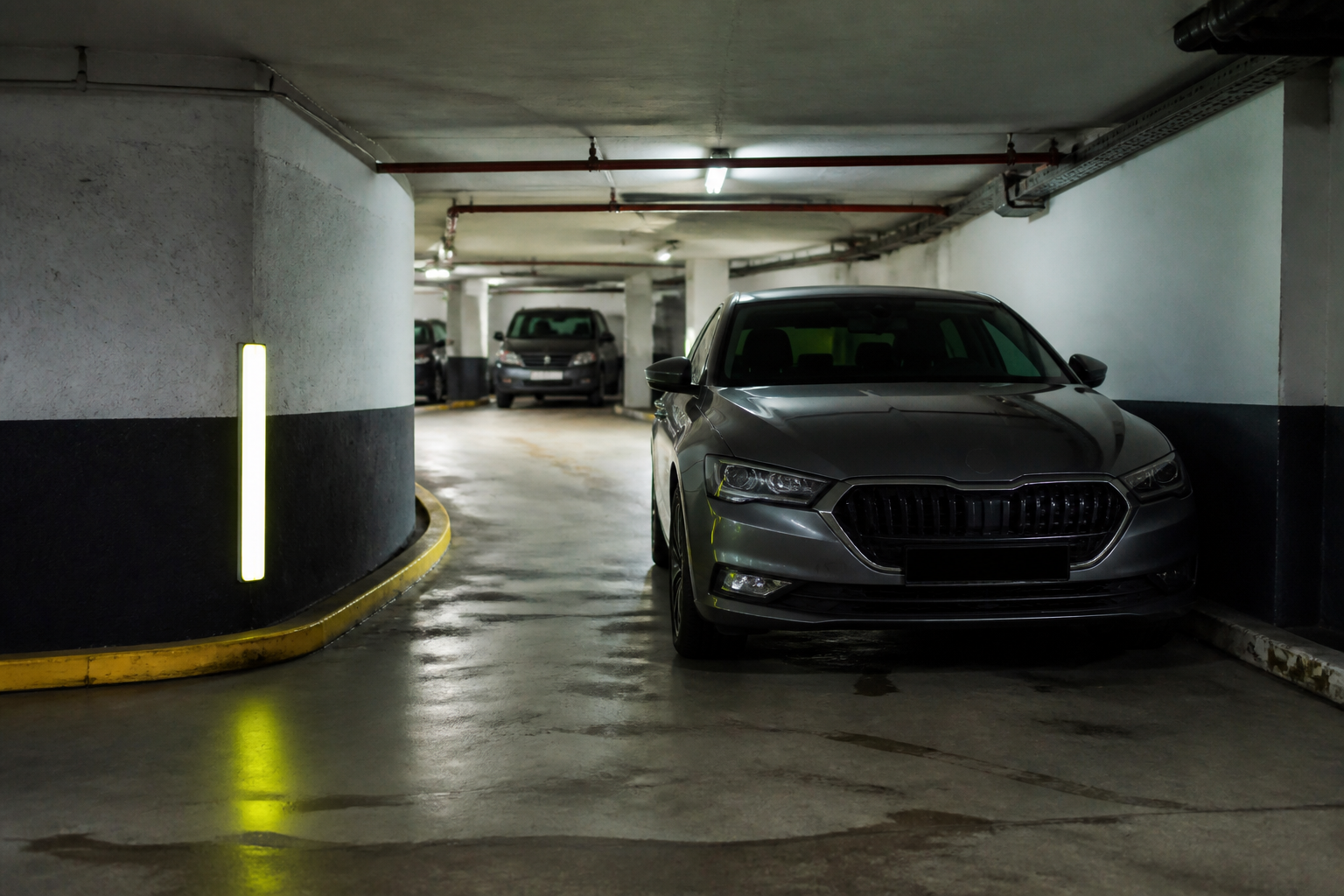 Parking souterrain étroit à Paris pour montage de pneus